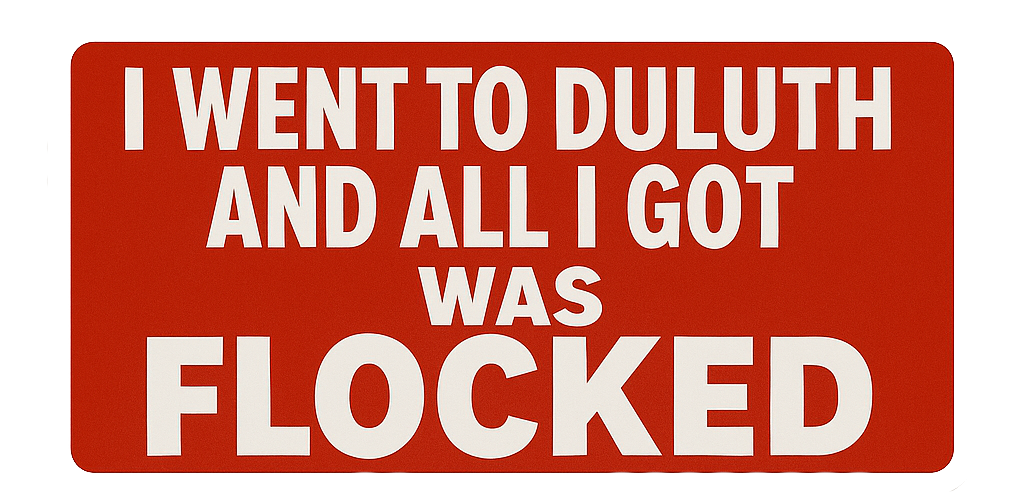 Bumper sticker with the text 'I went to Duluth and all I got was flocked' on a red background.